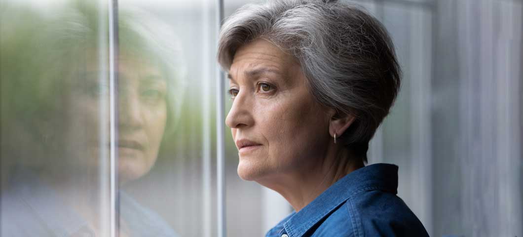 Caregiver looking out a window